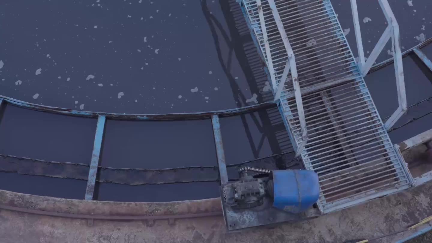 The effluent plant: a settling tank from above, the flow meters, and the water at the end of the line.